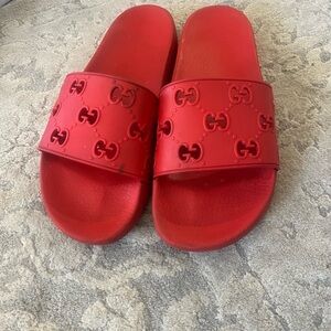 Authentic Gucci Men's rubber GG slide sandals